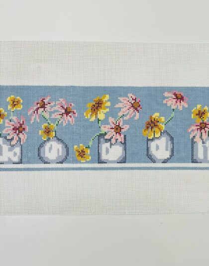 Row of vases with flowers